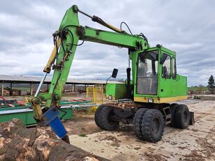 колесный экскаватор Caterpillar 206 B/FT