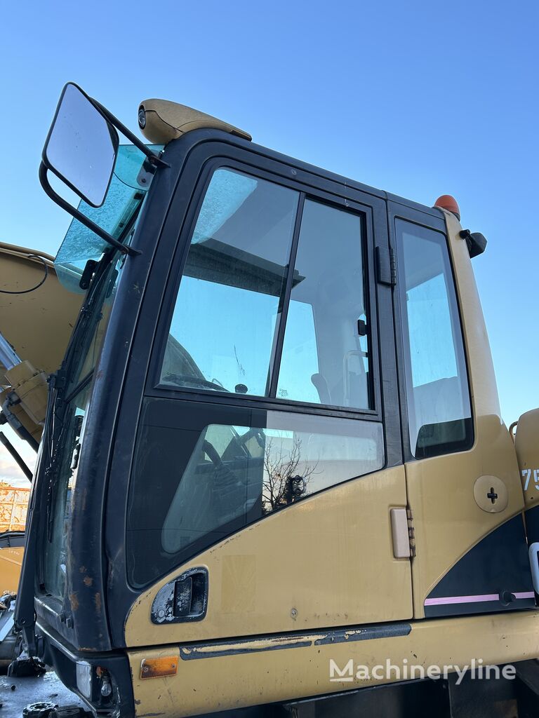 кабина Caterpillar M313C для экскаватора